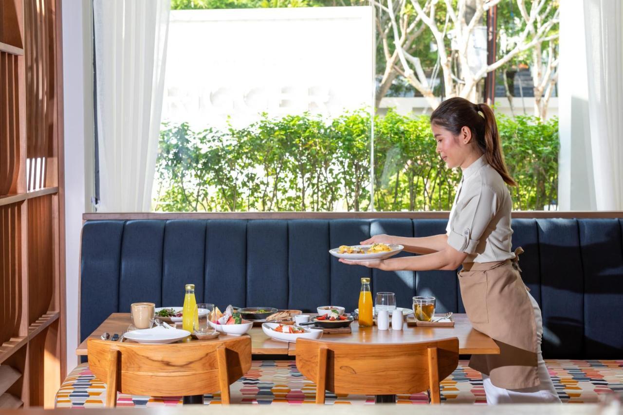 Outrigger Surin Beach Resort - Sha Extra Plus 외부 사진 A Thai waitress serving food