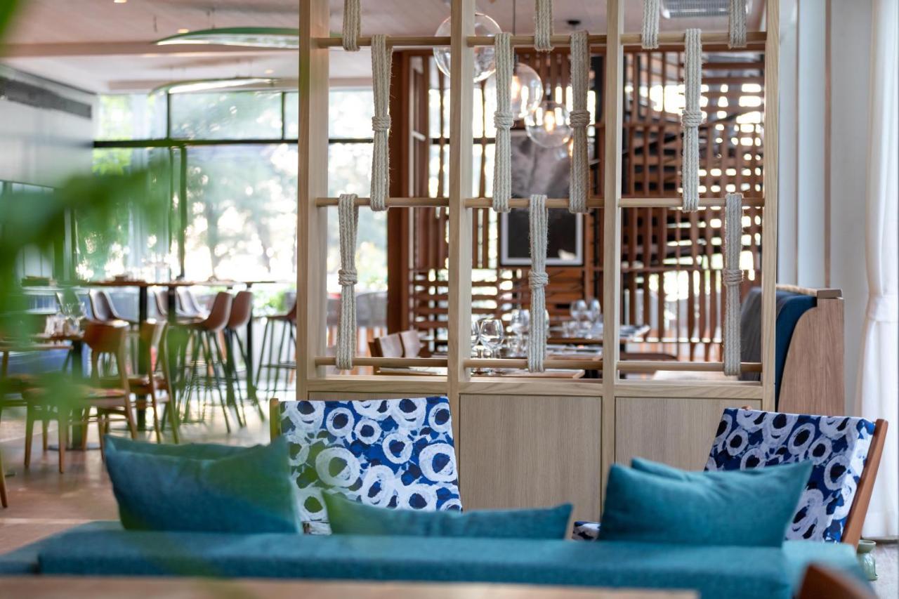 Outrigger Surin Beach Resort - Sha Extra Plus 외부 사진 The restaurant