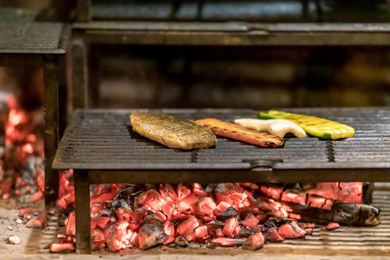 Outrigger Surin Beach Resort - Sha Extra Plus 외부 사진 Fish and vegetables on a grill