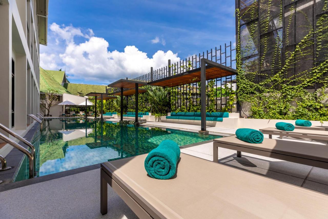 Outrigger Surin Beach Resort - Sha Extra Plus 외부 사진 The swimming pool at the hotel